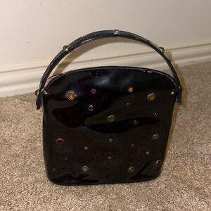 Elegant Black Handbag with Colorful Accents